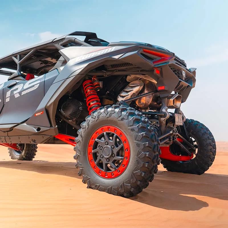 Can-Am Maverick R 4-seat dune buggy on Dubai desert dunes — photo 1