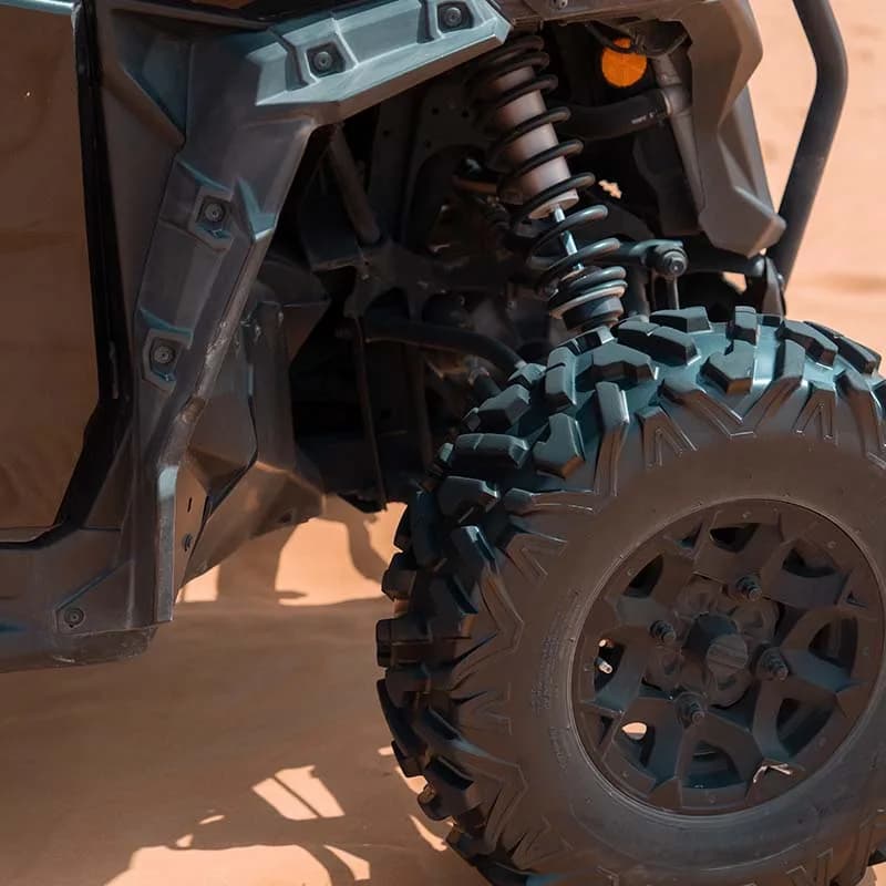 Can-Am Maverick Sport 4-seat dune buggy in the Dubai desert at golden hour — photo 1