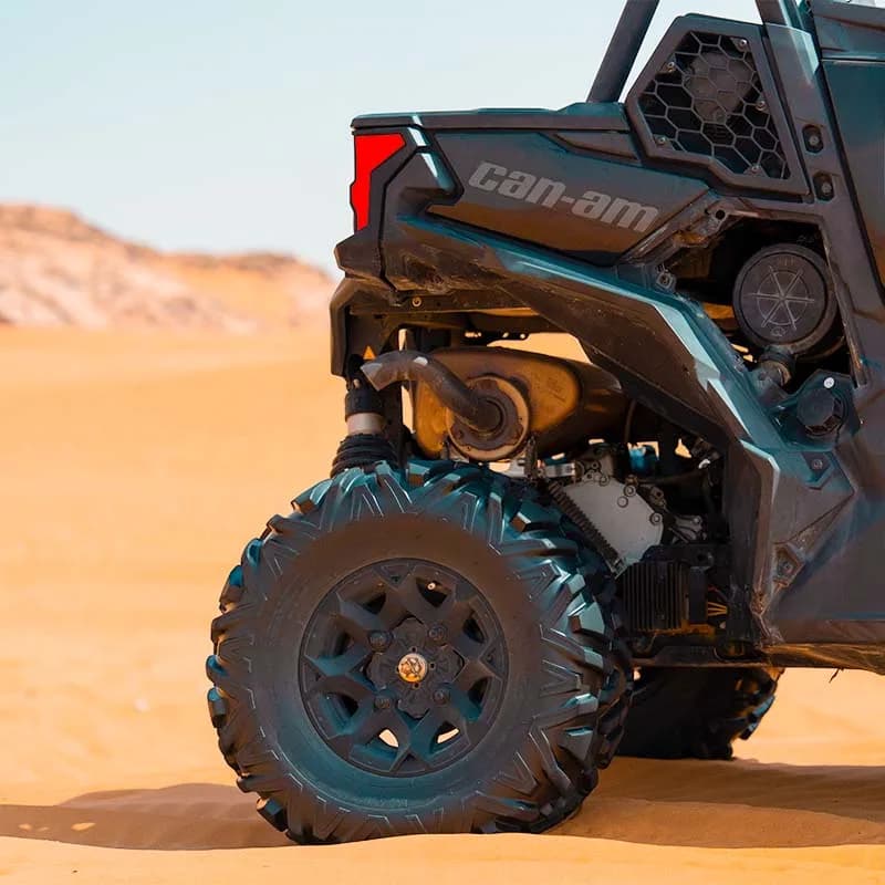 Can-Am Maverick Sport 4-seat dune buggy in the Dubai desert at golden hour — photo 3