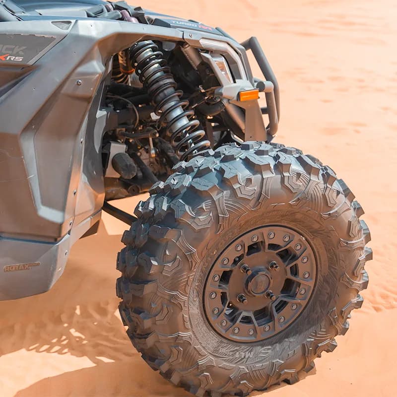 Can-Am X3 Turbo 4-seat dune buggy on the red dunes of the Dubai desert — photo 3