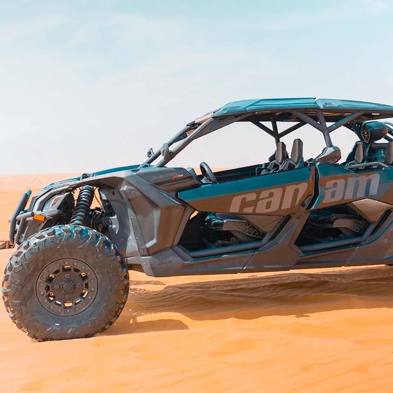 Can-Am X3 Turbo 4-seat dune buggy on the red dunes of the Dubai desert — photo 4