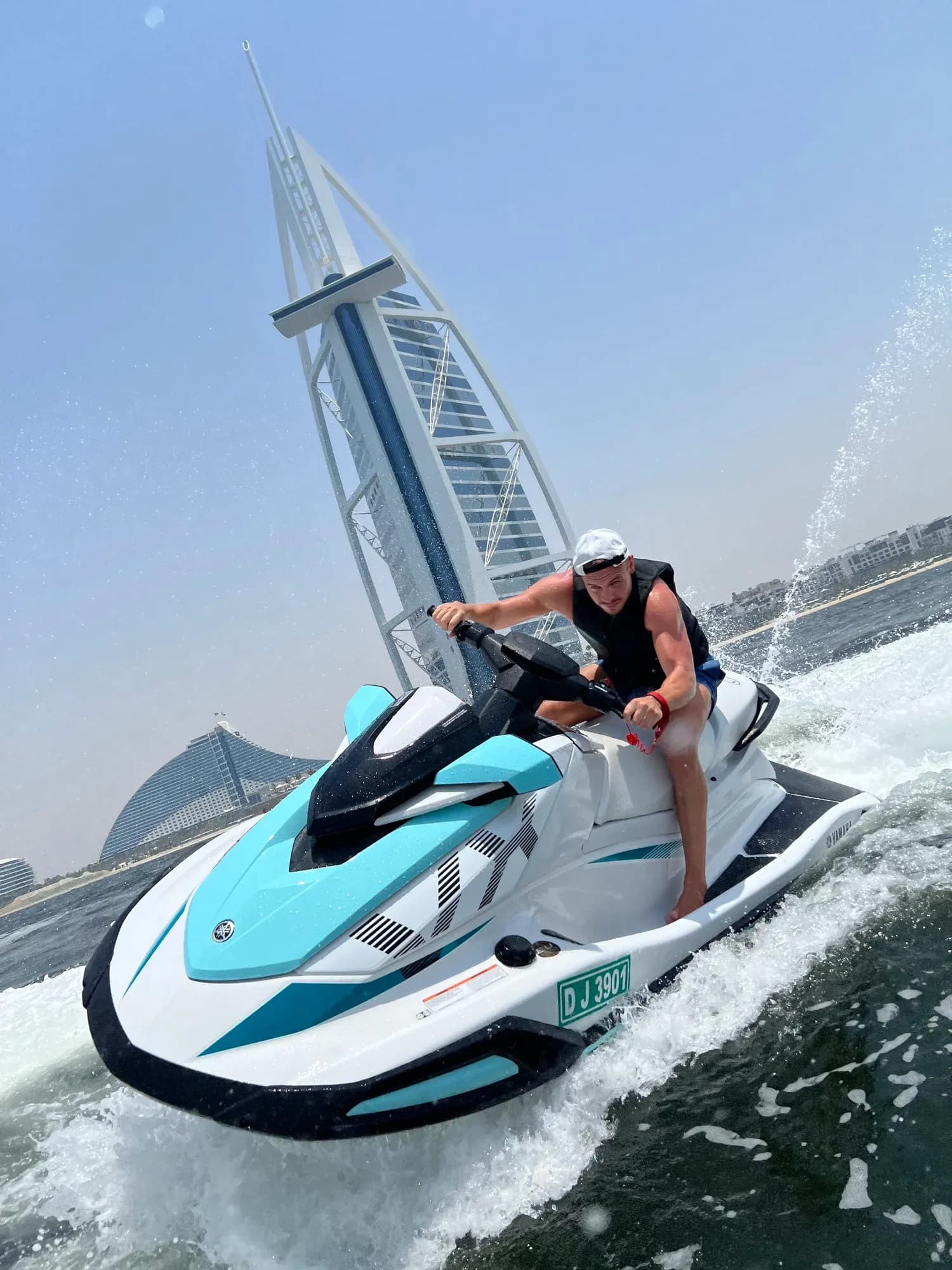 Yamaha VX 1050 jet ski on the water with the Dubai skyline behind — photo 2