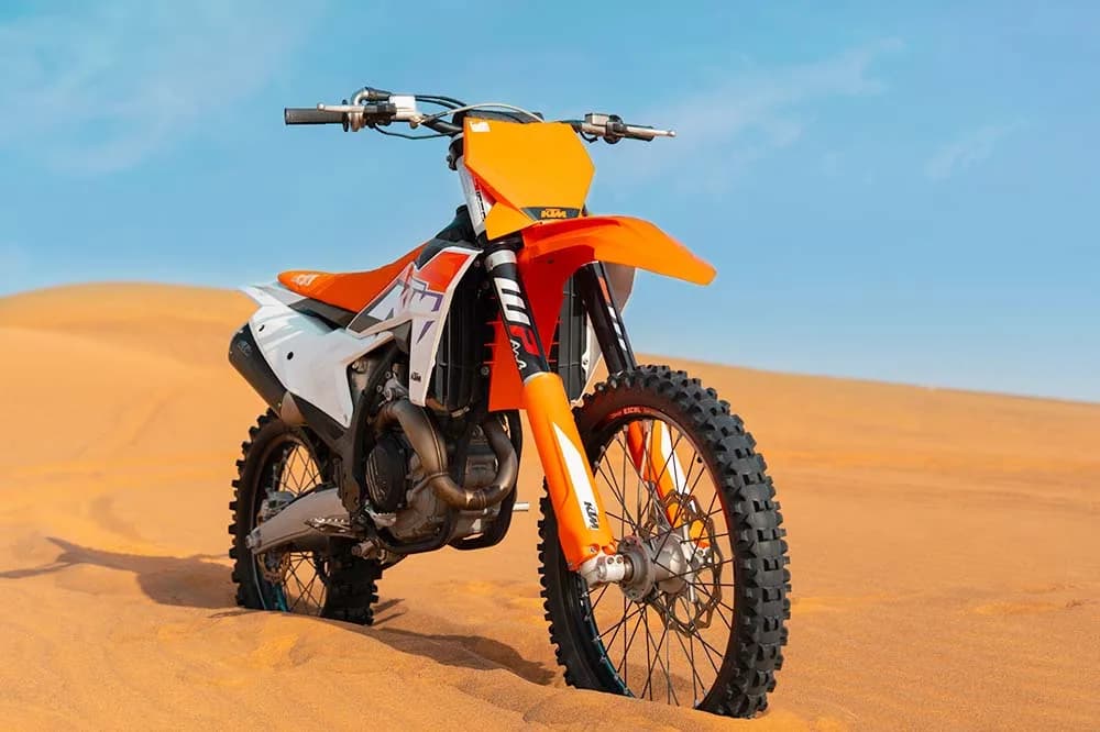 KTM 450 dirt bike on a Dubai desert dune trail