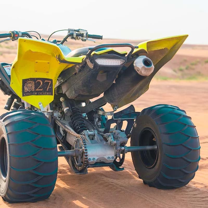 Yamaha 700 Raptor quad bike on the dunes of the Dubai desert — photo 1
