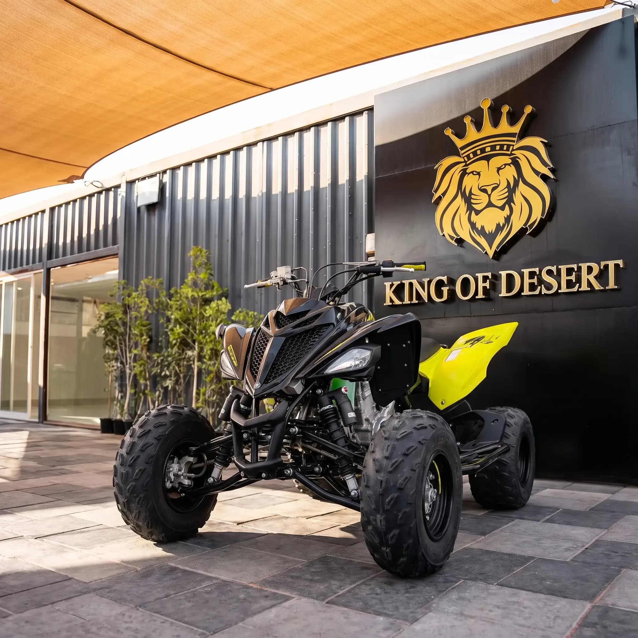 Yamaha Raptor 700 quad bike parked outside the King of Desert showroom in Dubai