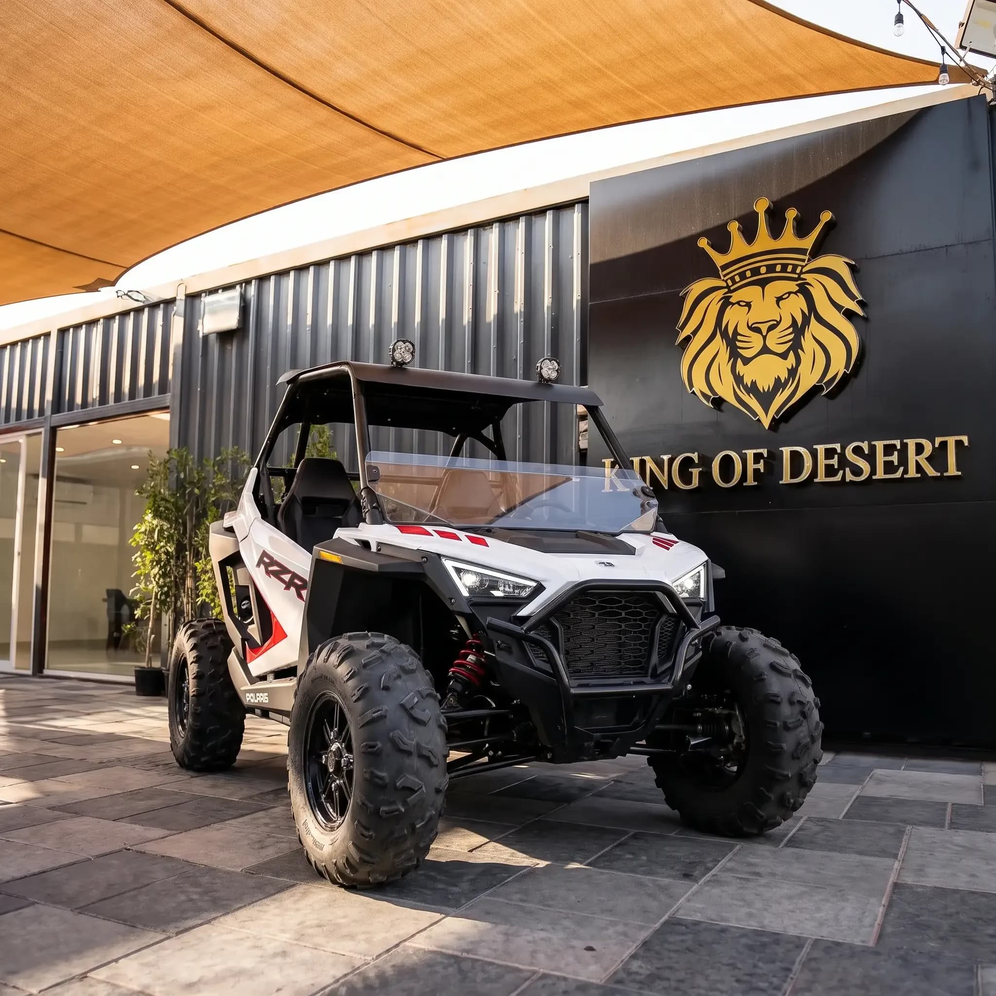 Polaris RZR 200 kids buggy parked outside the King of Desert showroom in Dubai