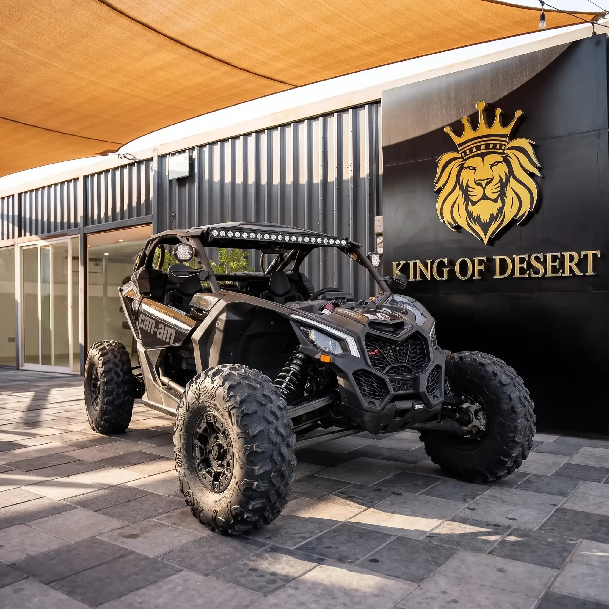 Two-seat Can-Am Maverick X3 Turbo buggy parked at the King of Desert showroom, Dubai